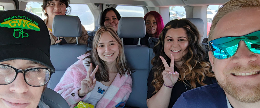 NextUp and Guardian Scholars selfie from inside a vehicle