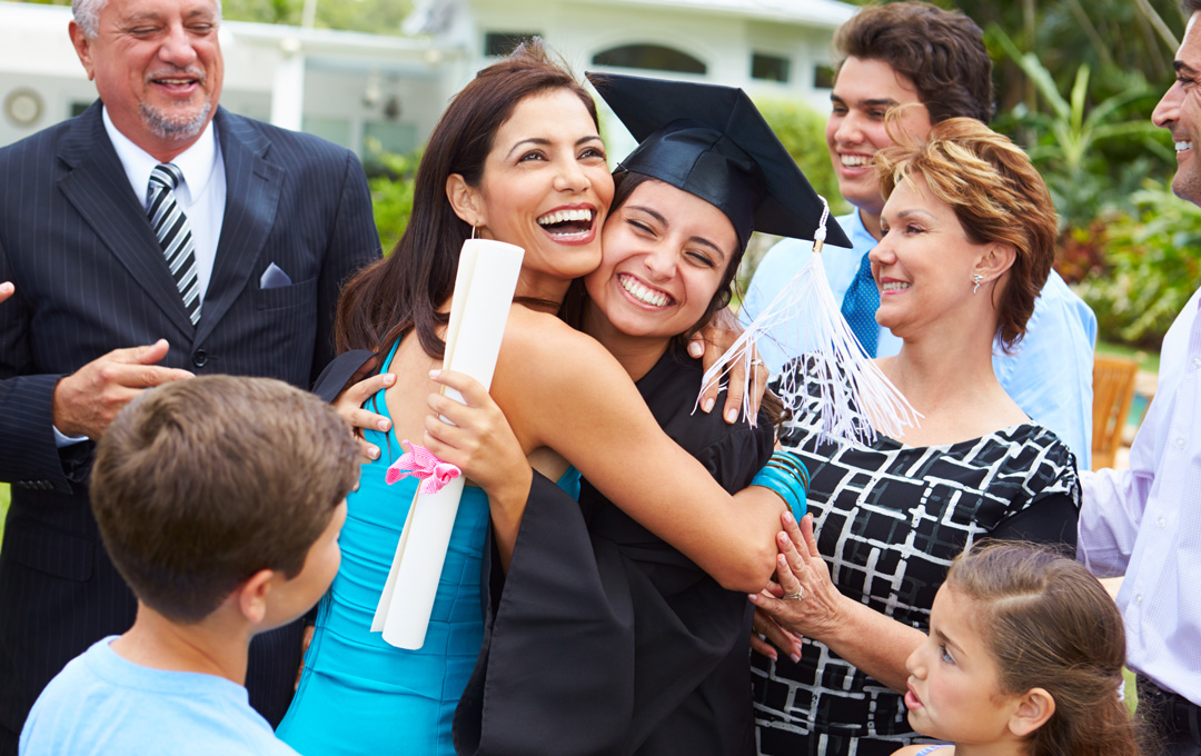 Student with family at Graduation